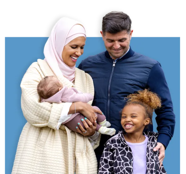 Islamic home finance - family in front of their new home